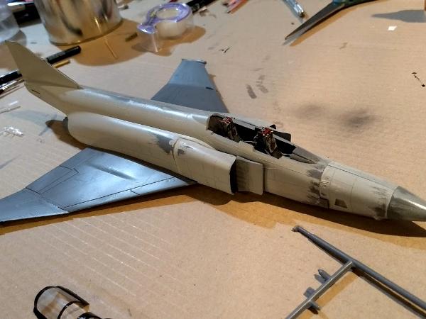 Fuselage and wings attached with base paint in process