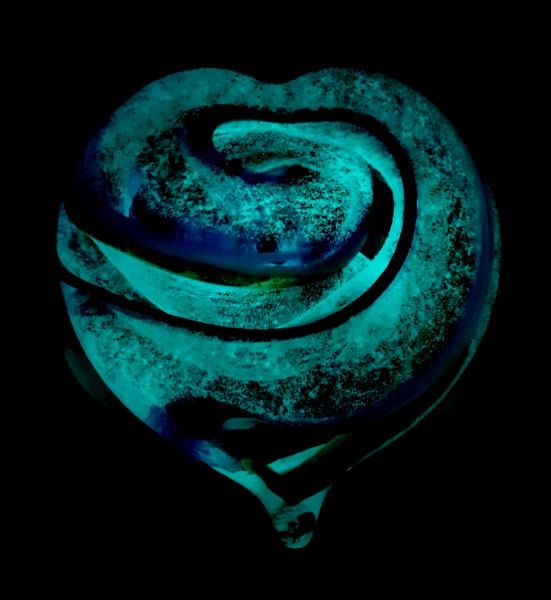 #10242513 Heart solid Glass Glow in Dark 3.18'' X 3.25''  $85.00