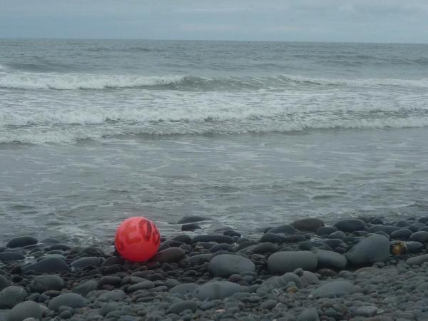 Red ball in the waves, Westward Ho!