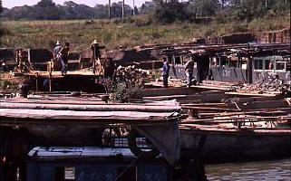 Chinese workersDumping coal Chinese workersDumping coal