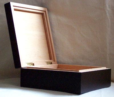 Open view of black wooden box Open view of black wooden box