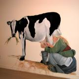 Milkmaid and cow