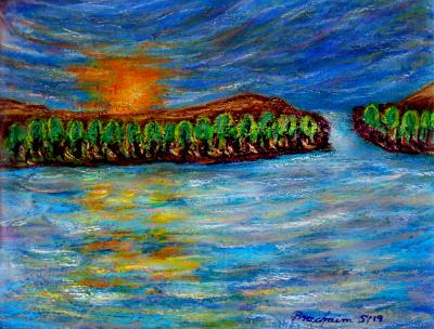 Sunset over palm-fringed isle