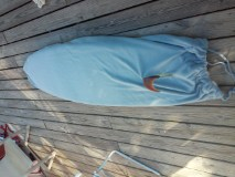 hand stitched custom surfboard bag with drawstring and fin opening