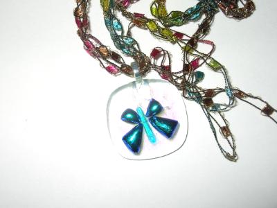 Blue Dichroic Butterfly on Clear Dichroic Glass Pendant with Rainbow Crocheted Chain Blue Dichroic Butterfly on Clear Dichroic Glass Pendant with Rainbow Crocheted Chain