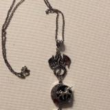 18" black cord necklace with butterfly and key pendant 