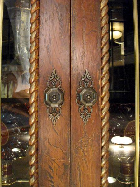 Cabinet detail with bronze edging