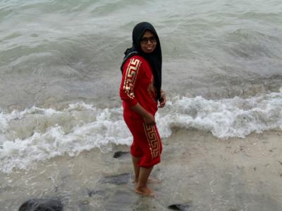 Yuli with her feet in the Java Sea