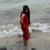 Yuli with her feet in the Java Sea