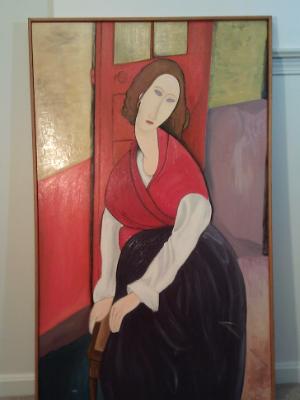 A reproduction of *Portrait of Jeanne Hebuterne* by Amadeo Modigliani A reproduction of *Portrait of Jeanne Hebuterne* by Amadeo Modigliani