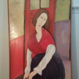 A reproduction of *Portrait of Jeanne Hebuterne* by Amadeo Modigliani