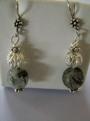#63  rutilated quartz and sterling bead