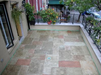 Cement patio treated with jewelstone Cement patio treated with jewelstone