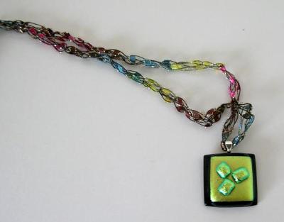 Green Dichroic Glass on Black with Crocheted Chain