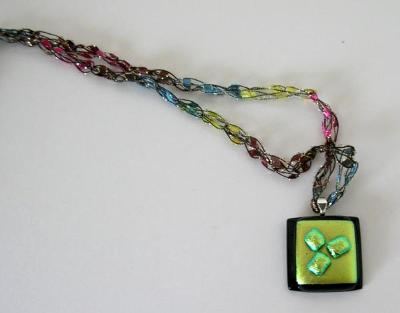 Green Dichroic Glass on Black with Crocheted Chain Green Dichroic Glass on Black with Crocheted Chain