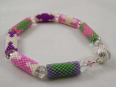 B-33 pink, purple, ivory, & green bead tube bracelet B-33 pink, purple, ivory, & green bead tube bracelet