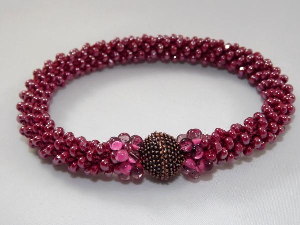 B-64 sparkling magenta crocheted rope bracelet