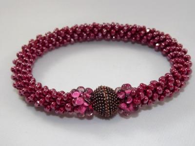 B-64 sparkling magenta crocheted rope bracelet