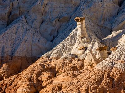 White and Chocolate Hoodoos Against Blue Cliffs White and Chocolate Hoodoos Against Blue Cliffs