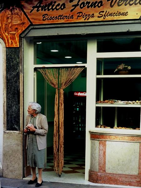 Woman exiting, Palermo, Sicily