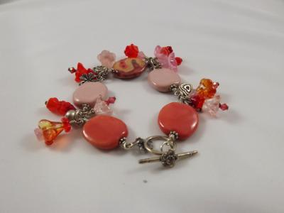 B-4 coral kazuri bead & flower charm bracelet