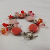 B-4 coral kazuri bead & flower charm bracelet