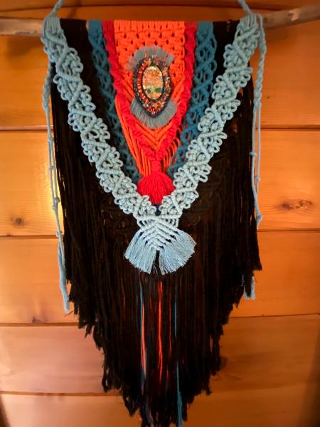 Black/orange Macrame with bead embroidery around a dichroic glass centerpiece