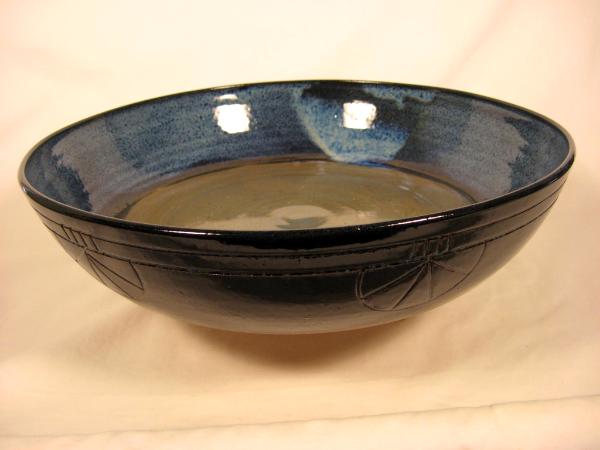 120512.B Flat Bottom Bowl with Decorative Carving Outside