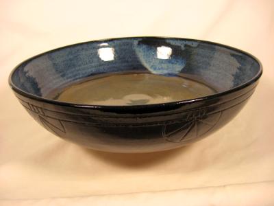 120512.B Flat Bottom Bowl with Decorative Carving Outside