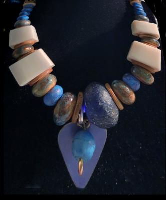 African glass, handmade clay, assorted components African glass, handmade clay, assorted components