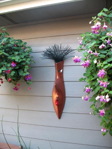 Dream Mask in patio between two Fuchsias