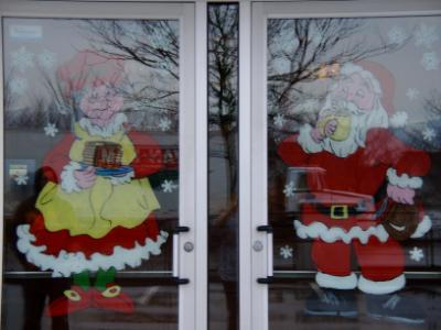 Mrs. Claus with pancakes Santa with coffee