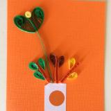 Orange vase with flowers handmade quilling greeting card.