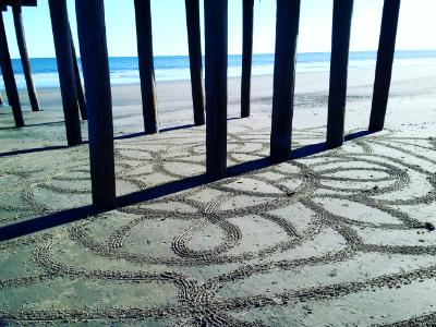 Large scale sand mandala at 14th st Fishing pier