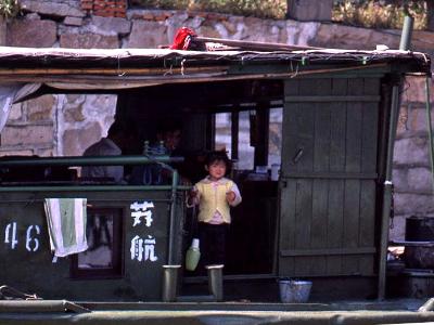 Chinese boat girl in yellow