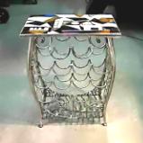 "GLASS & STEEL WINE BOTTLE STAND" by Steve Hazard