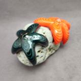 #07282309 starfish on rock 5''Hx8''Wx5.5''D $250