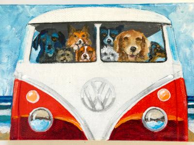 EIGHT DOGS ON THE BEACH