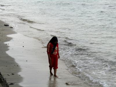 Yuli walking on the beach Yuli walking on the beach