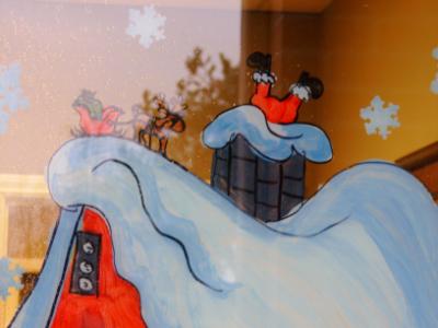Santa falling in chimney