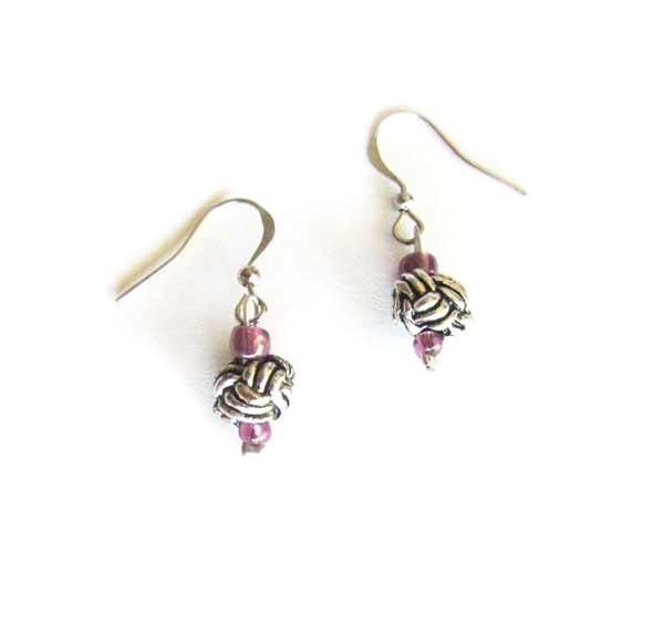Purple celtic knot silver tone earrings