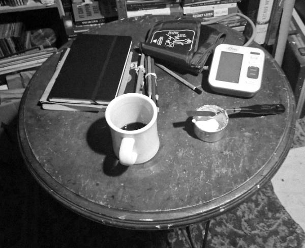 Still Life With Coffee, Paint, and BP Monitor