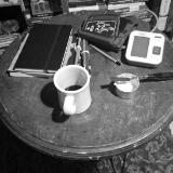 Still Life With Coffee, Paint, and BP Monitor