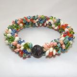 B-40 orange, blue, ivory, peach, & green spikey bracelet