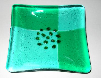 Turquoise and green garlic and oil plate