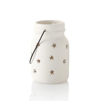 Jar star lantern. 5.5H x 3.25W