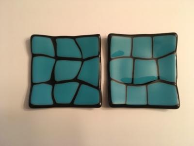 Turquoise on black plates