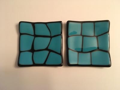 Turquoise on black plates Turquoise on black plates