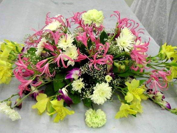 Enjoy learning oval shaped floral arrangement California