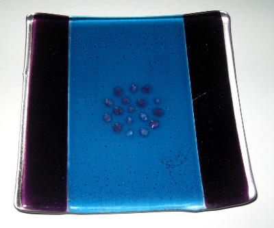 Purple and blue garlic and oil plate